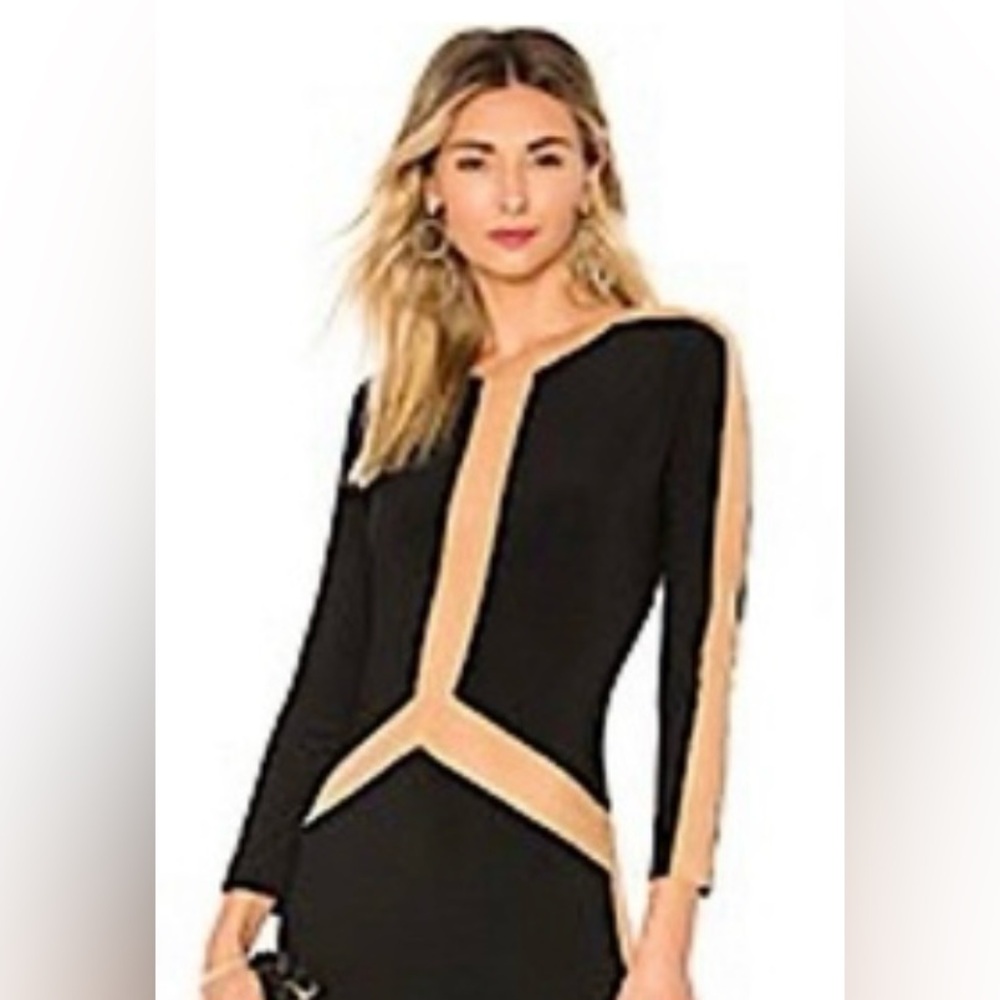 Norma Kamali Black straight leg jumpsuit with sheer mesh sides. Size XS